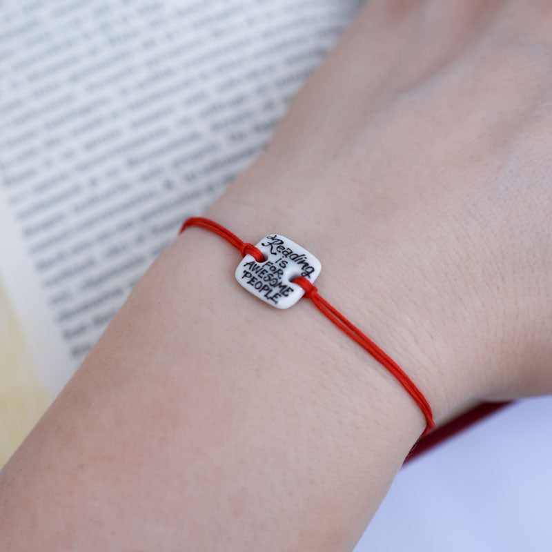 Reading is for awesome people Porcelain bracelet handmade and hand painted by Vali Bondoc. Bratara din portelan modelata si pictata manual de Vali Bondoc