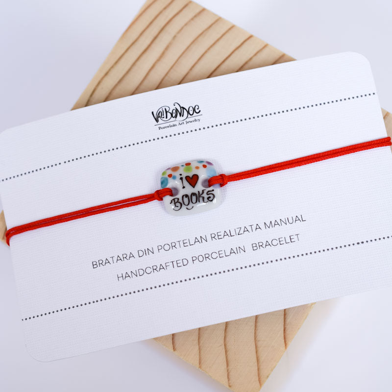 I love books Porcelain bracelet handmade and hand painted by Vali Bondoc. Bratara din portelan modelata si pictata manual de Vali Bondoc