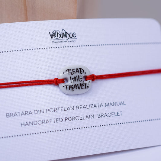 Read, Love, Travel Porcelain bracelet handmade and hand painted by Vali Bondoc. Bratara din portelan modelata si pictata manual de Vali Bondoc