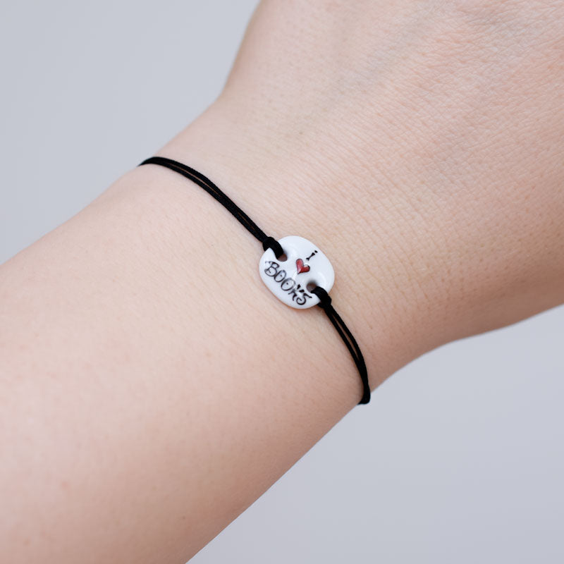 I love books Porcelain bracelet handmade and hand painted by Vali Bondoc. Bratara din portelan modelata si pictata manual de Vali Bondoc