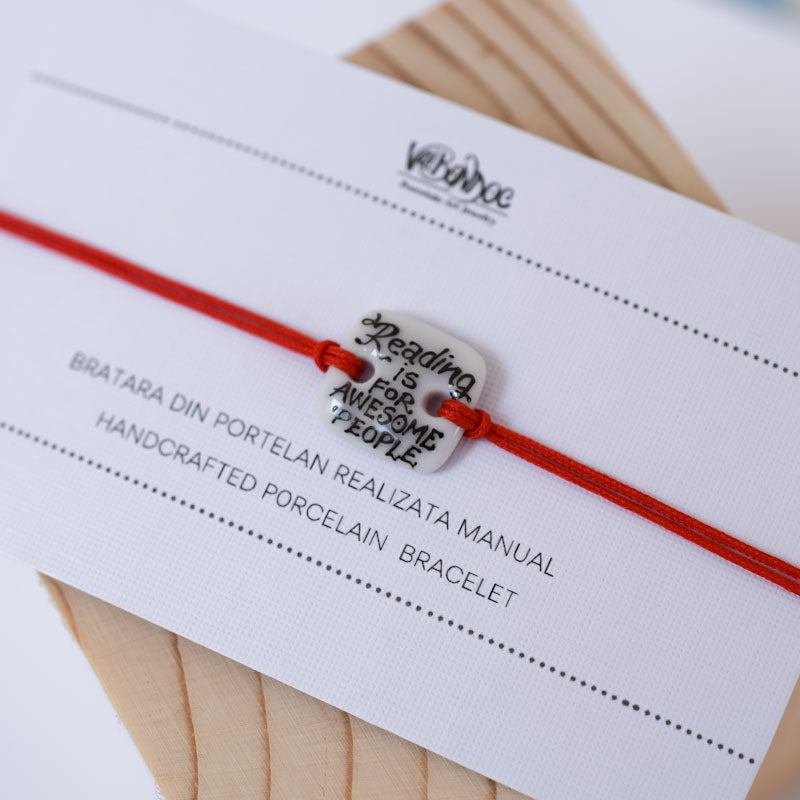 Reading is for awesome people Porcelain bracelet handmade and hand painted by Vali Bondoc. Bratara din portelan modelata si pictata manual de Vali Bondoc