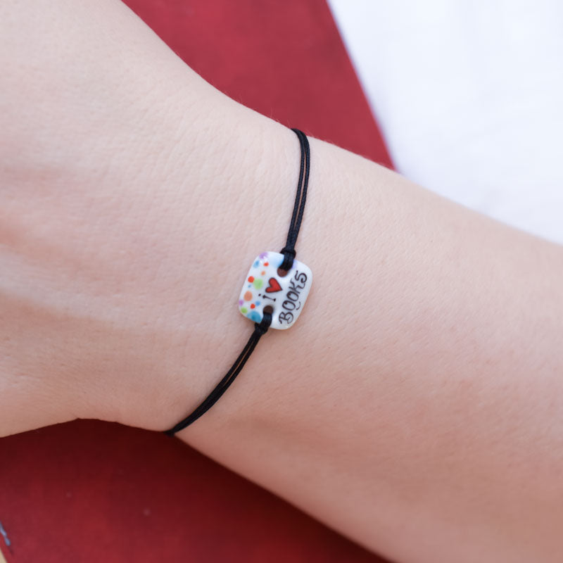 I love books Porcelain bracelet handmade and hand painted by Vali Bondoc. Bratara din portelan modelata si pictata manual de Vali Bondoc