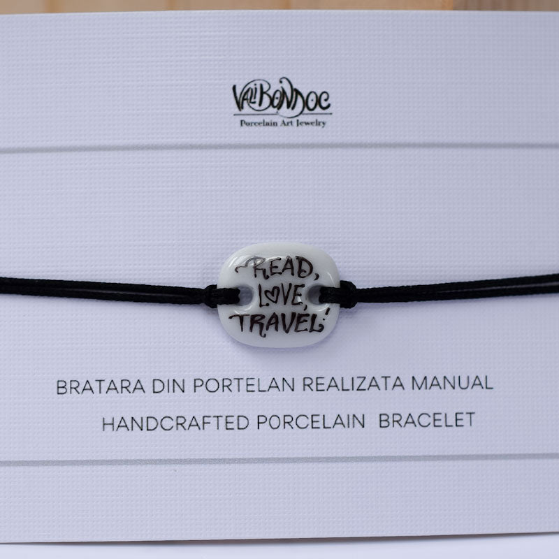 Read, Love, Travel Porcelain bracelet handmade and hand painted by Vali Bondoc. Bratara din portelan modelata si pictata manual de Vali Bondoc