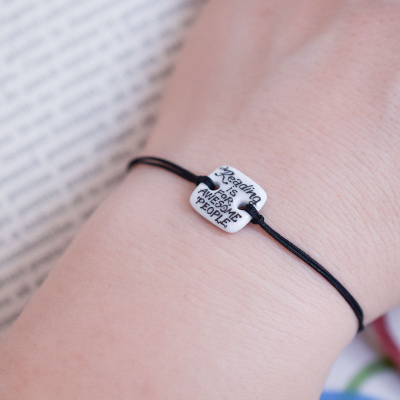 Reading is for awesome people Porcelain bracelet handmade and hand painted by Vali Bondoc. Bratara din portelan modelata si pictata manual de Vali Bondoc