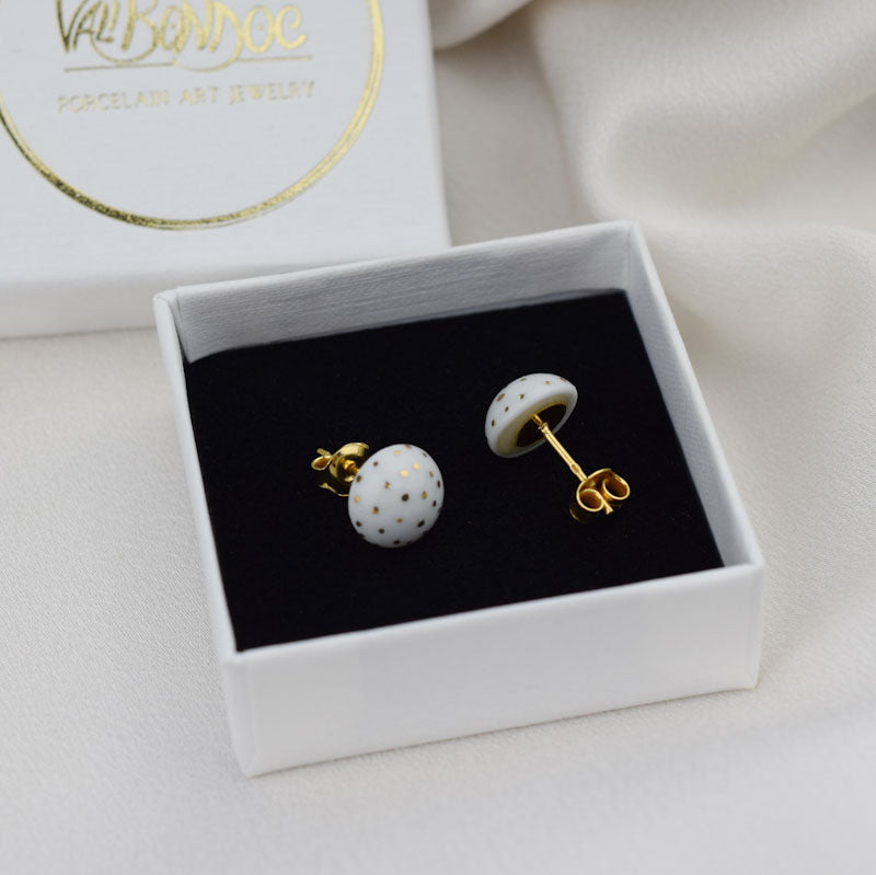 Porcelain stud earrings created and hand-painted by Vali Bondoc with high temperature ceramic dyes and colloidal gold