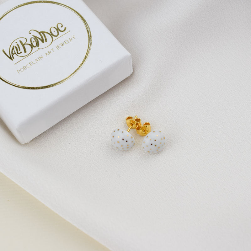 Porcelain stud earrings created and hand-painted by Vali Bondoc with high temperature ceramic dyes and colloidal gold