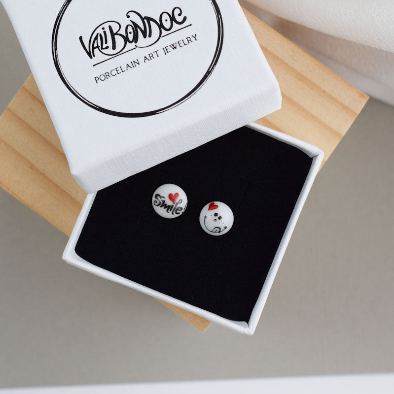 Porcelain stud earrings created and hand-painted by Vali Bondoc with high temperature ceramic dyes