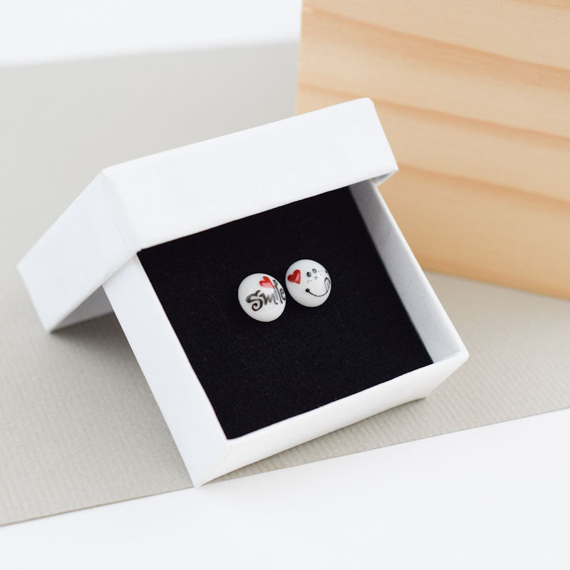 Porcelain stud earrings created and hand-painted by Vali Bondoc with high temperature ceramic dyes