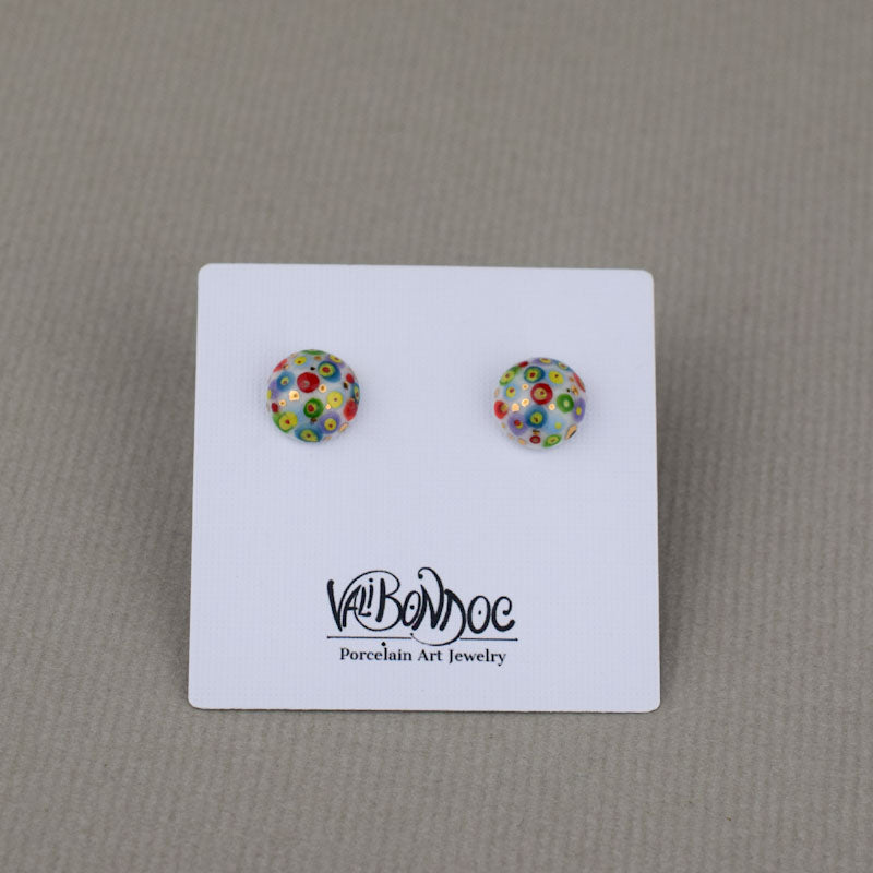 Porcelain stud earrings created and hand-painted by Vali Bondoc with high temperature ceramic dyes and colloidal gold