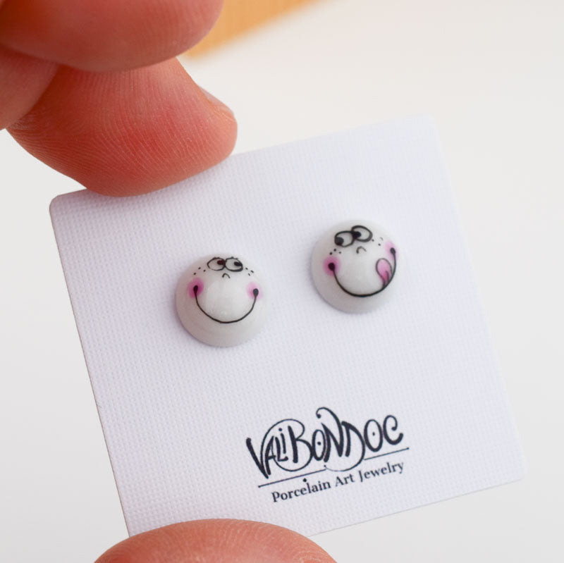 Porcelain stud earrings created and hand-painted by Vali Bondoc with high temperature ceramic dyes and platinum