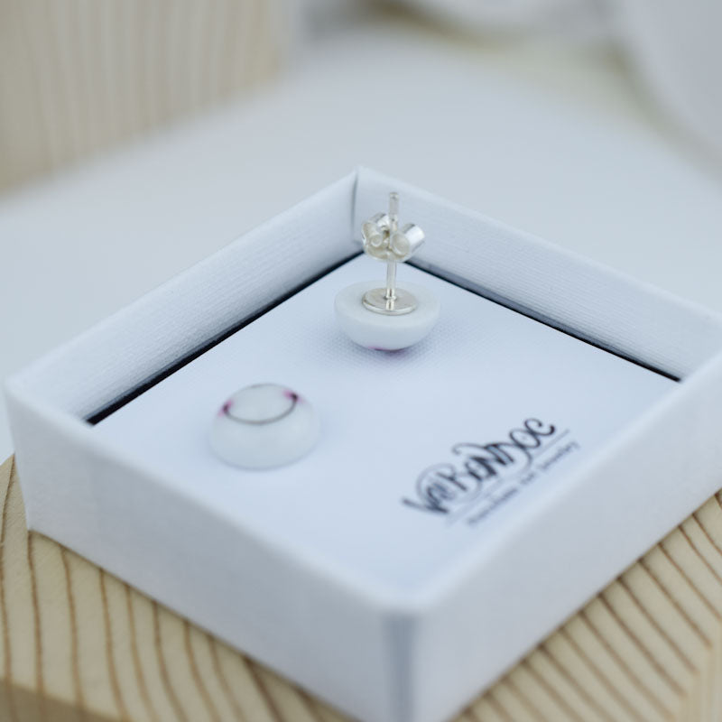 Porcelain stud earrings created and hand-painted by Vali Bondoc with high temperature ceramic dyes