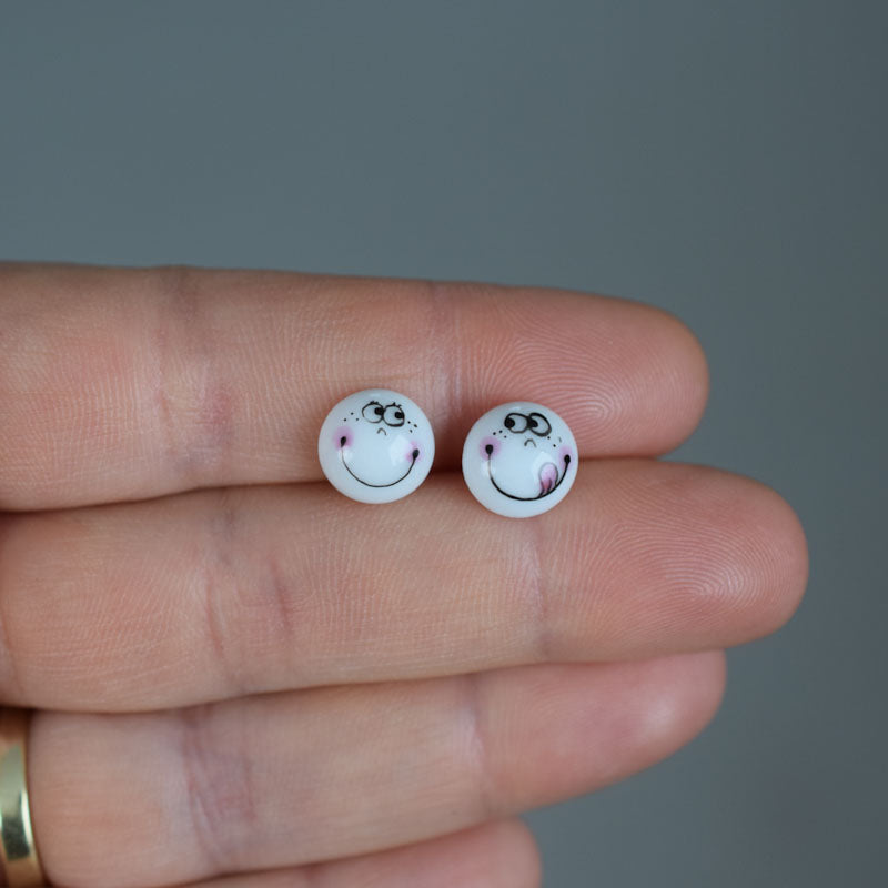 Porcelain stud earrings created and hand-painted by Vali Bondoc with high temperature ceramic dyes and gold