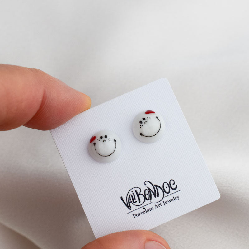 Porcelain stud earrings created and hand-painted by Vali Bondoc with high temperature ceramic dyes