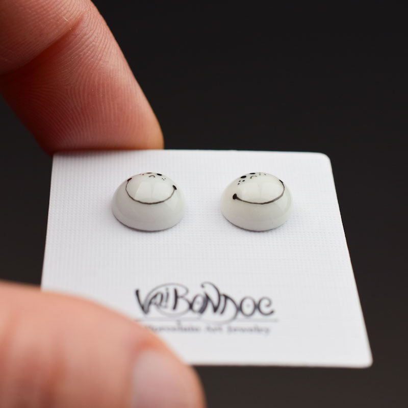 Porcelain stud earrings created and hand-painted by Vali Bondoc with high temperature ceramic dyes