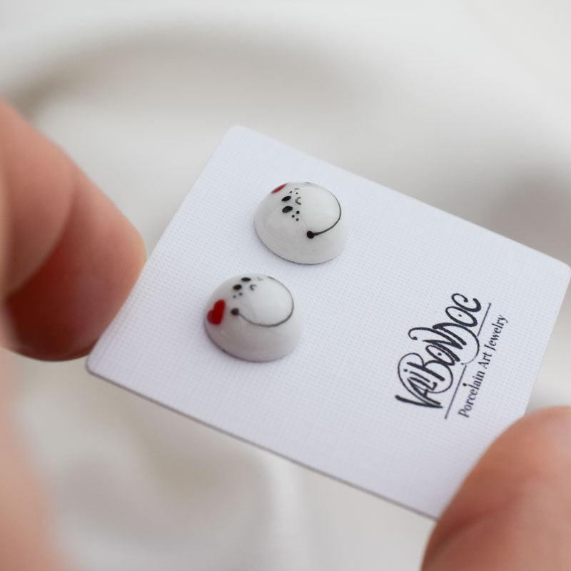 Porcelain stud earrings created and hand-painted by Vali Bondoc with high temperature ceramic dyes