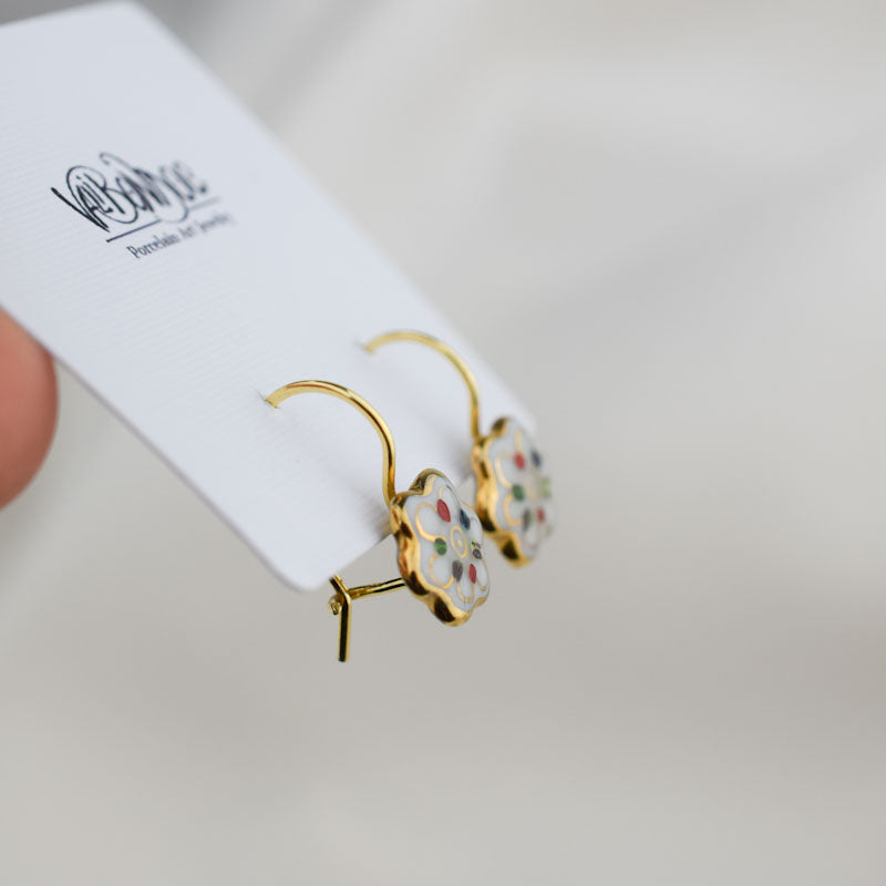 Porcelain hook earrings created and hand-painted by Vali Bondoc with high temperature ceramic dyes and colloidal gold