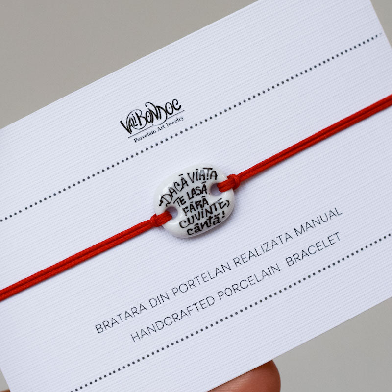 Daca viata te lasa fara cuvinte, canta! Porcelain bracelet handmade and hand painted by Vali Bondoc
