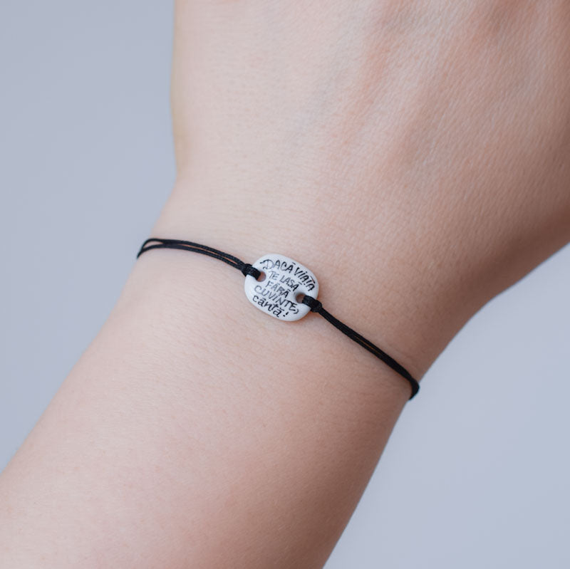 Daca viata te lasa fara cuvinte, canta! Porcelain bracelet handmade and hand painted by Vali Bondoc
