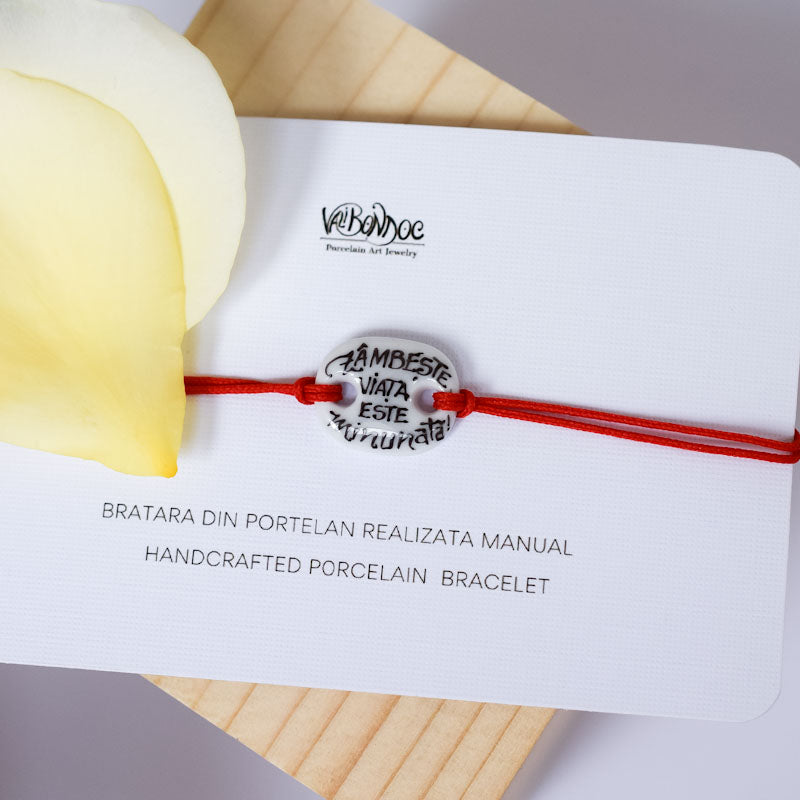 Zambeste, viata este minunata! Porcelain bracelet handmade and hand painted by Vali Bondoc. Bratara din portelan modelata si pictata manual de Vali Bondoc