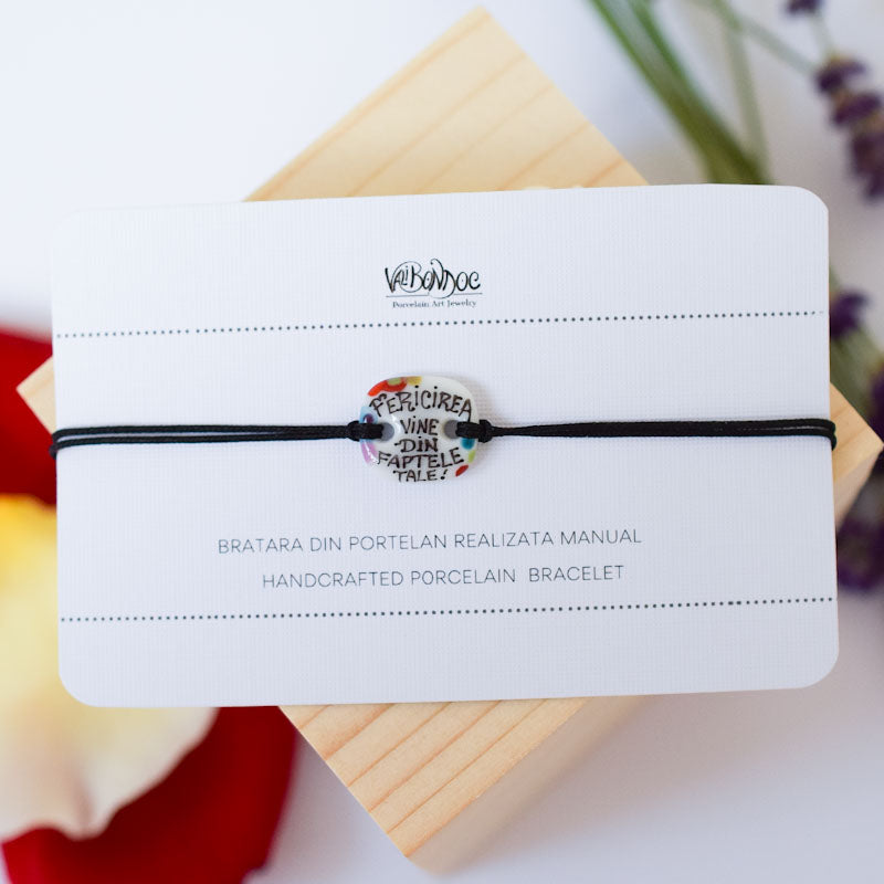 Fericirea vine din faptele tale Porcelain bracelet handmade and hand painted by Vali Bondoc. Bratara din portelan modelata si pictata manual de Vali Bondoc