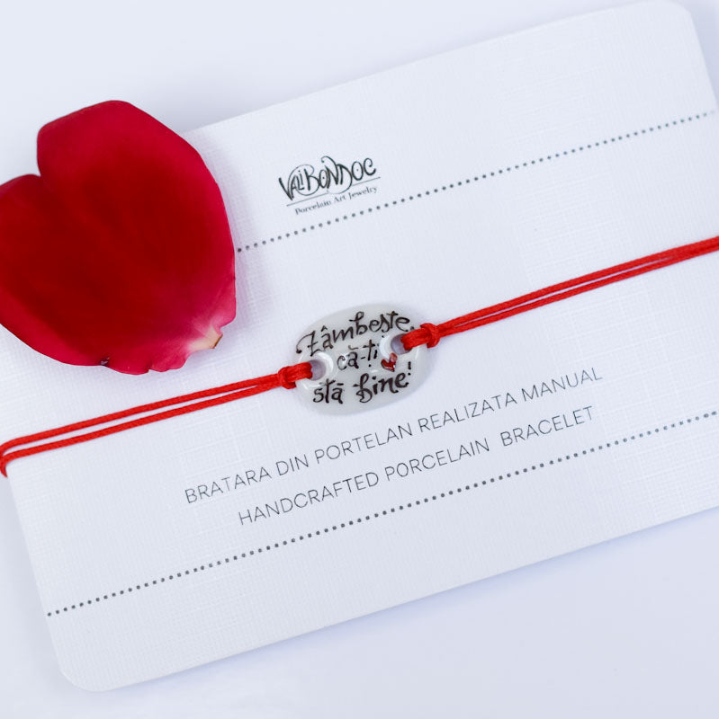 Zambeste, ca-ti sta bine! Porcelain bracelet handmade and hand painted by Vali Bondoc. Bratara din portelan modelata si pictata manual de Vali Bondoc