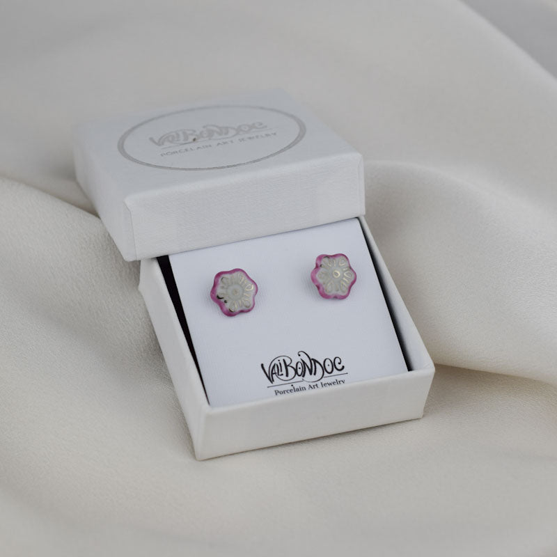 Porcelain stud earrings created and hand-painted by Vali Bondoc with high temperature ceramic dyes and colloidal gold