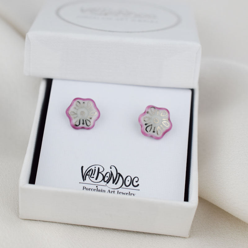 Porcelain stud earrings created and hand-painted by Vali Bondoc with high temperature ceramic dyes and colloidal gold