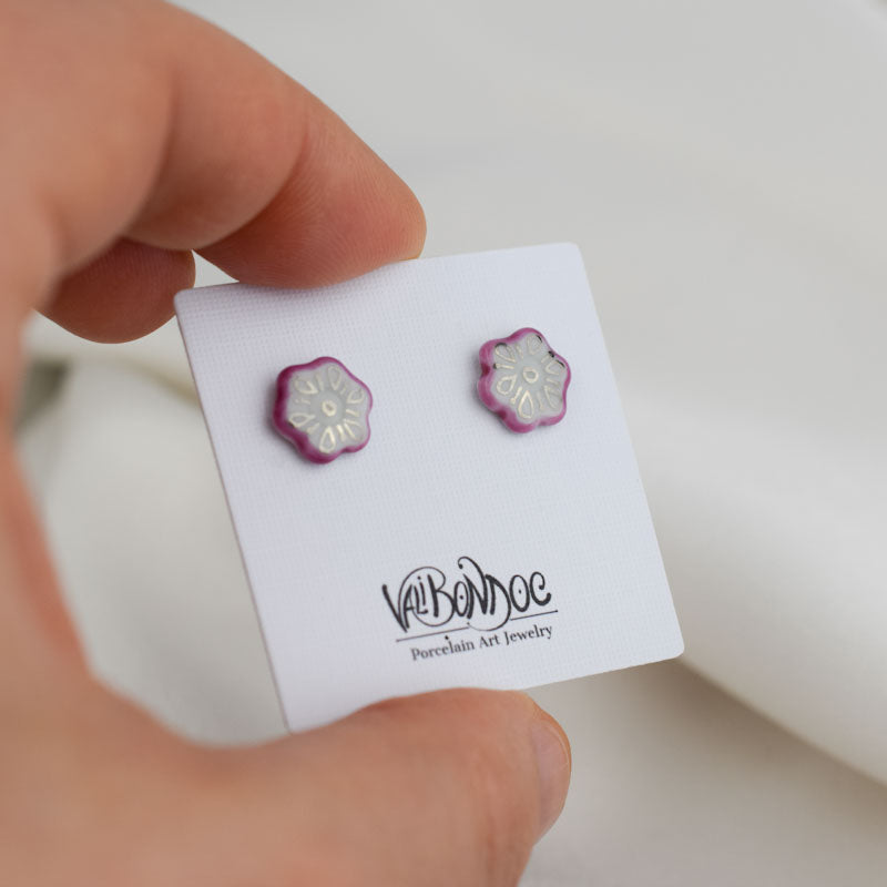 Porcelain stud earrings created and hand-painted by Vali Bondoc with high temperature ceramic dyes and colloidal gold