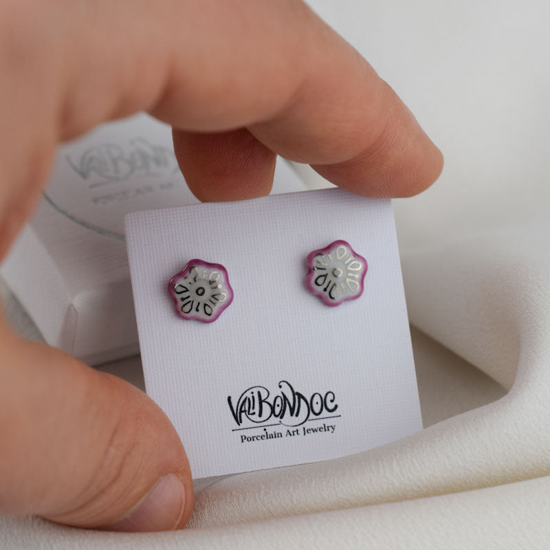 Porcelain stud earrings created and hand-painted by Vali Bondoc with high temperature ceramic dyes and colloidal gold