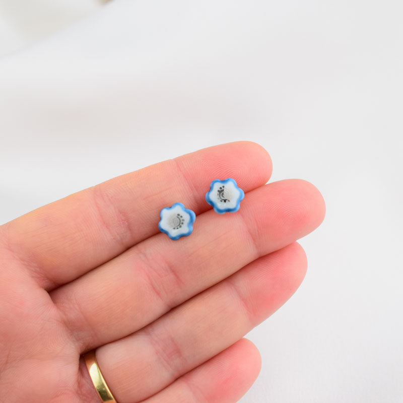 Porcelain stud earrings created and hand-painted by Vali Bondoc with high temperature ceramic dyes