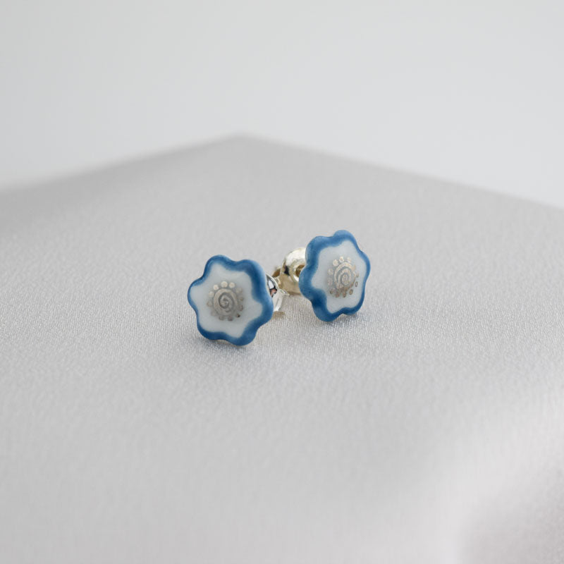Porcelain stud earrings created and hand-painted by Vali Bondoc with high temperature ceramic dyes and gold