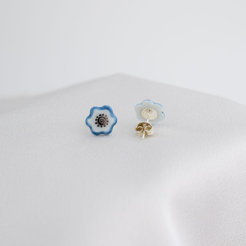 Porcelain stud earrings created and hand-painted by Vali Bondoc with high temperature ceramic dyes and platinum