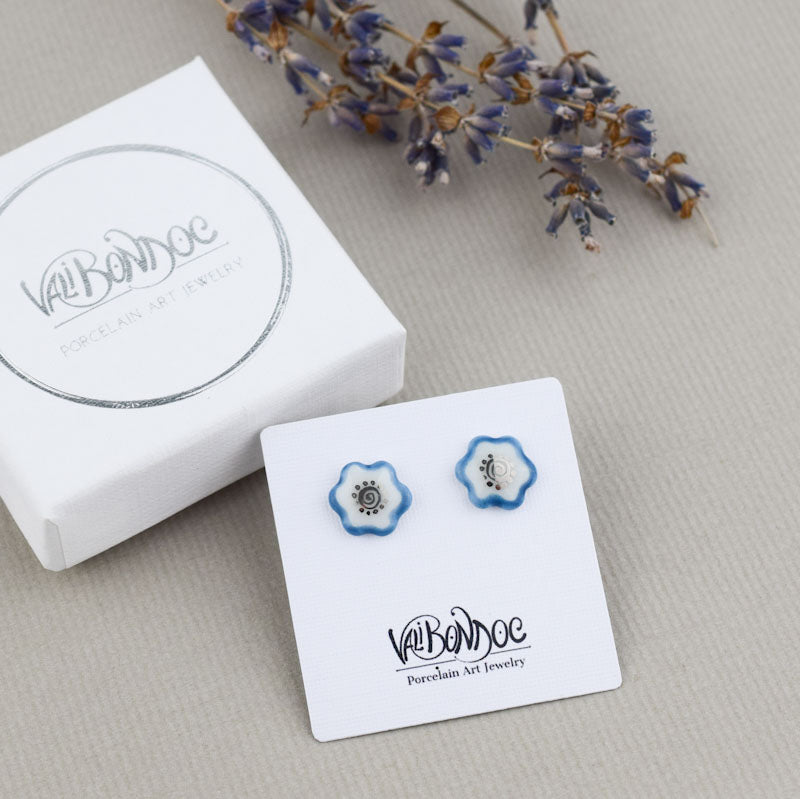Porcelain stud earrings created and hand-painted by Vali Bondoc with high temperature ceramic dyes and colloidal platinum