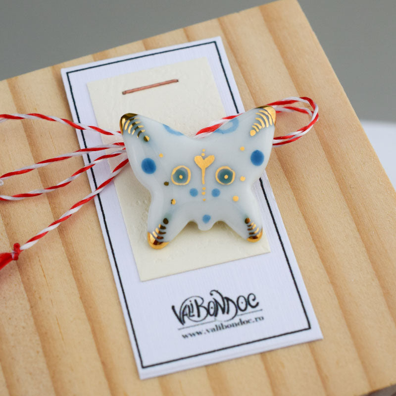 Small butterfly.Little porcelain brooch modeled and painted by Vali Bondoc