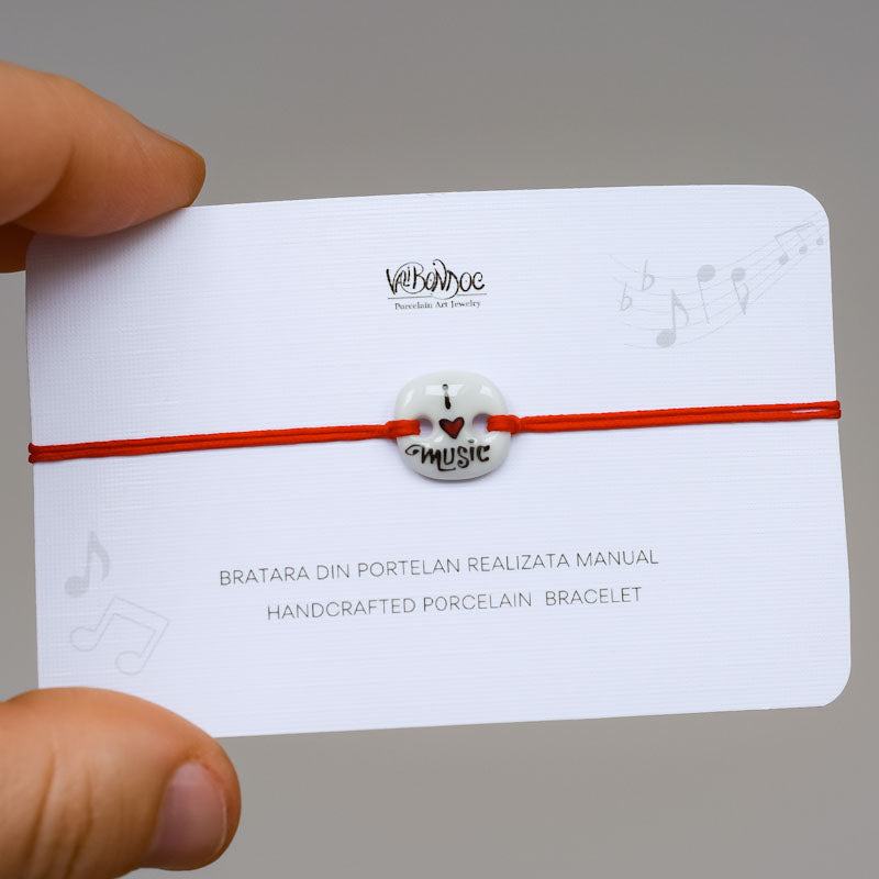 I love music. Porcelain bracelet handmade and hand painted by Vali Bondoc