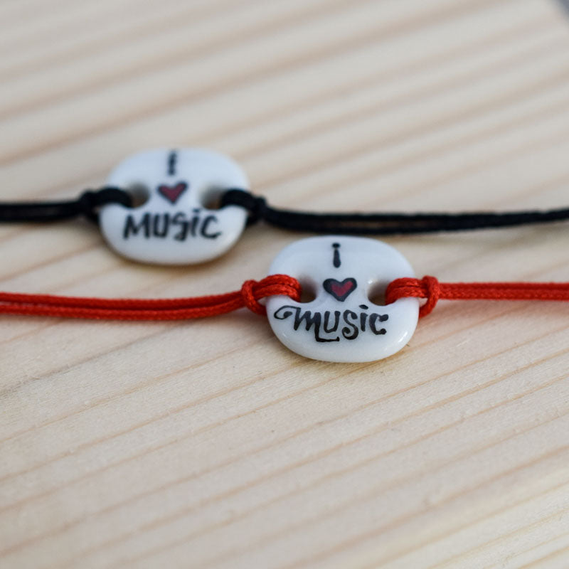 I love music. Porcelain bracelet handmade and hand painted by Vali Bondoc