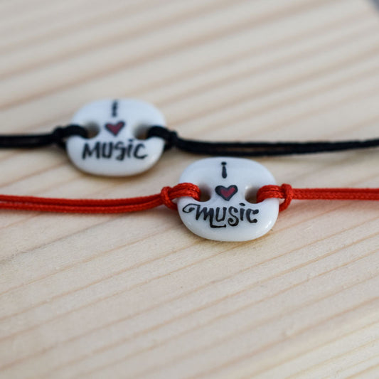 I love music. Porcelain bracelet handmade and hand painted by Vali Bondoc