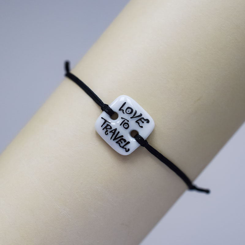 Love to travel. Porcelain bracelet handmade and hand painted by Vali Bondoc
