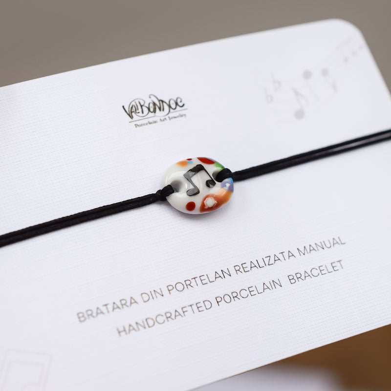 Musical note. Porcelain bracelet handmade and hand painted by Vali Bondoc
