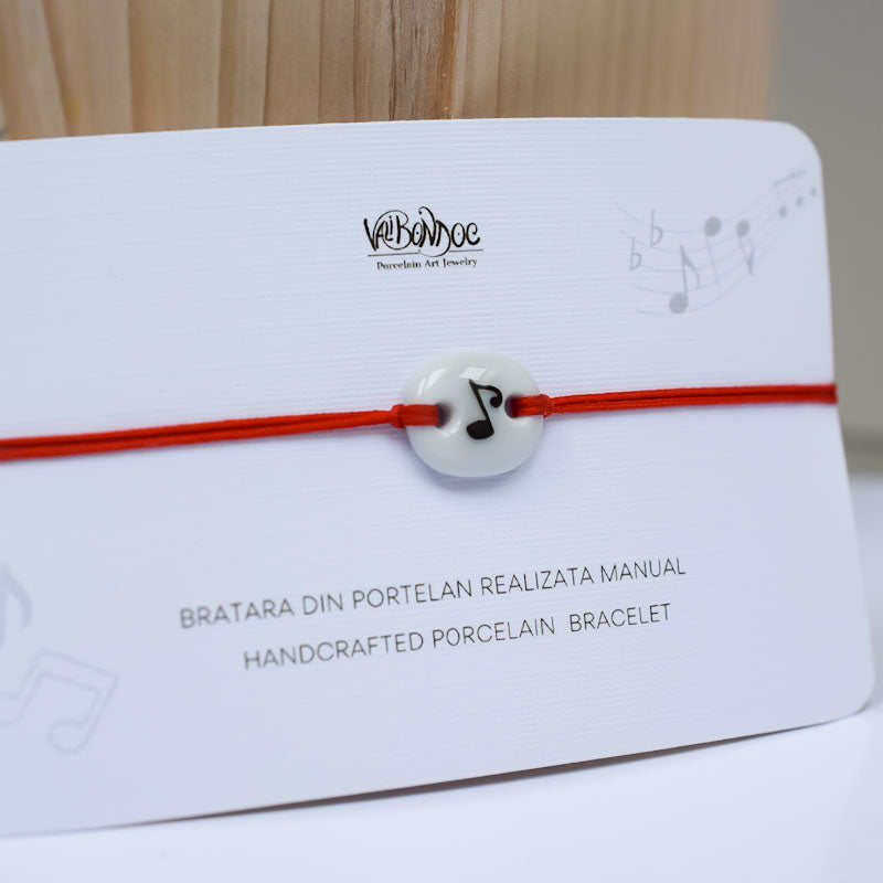 Musical note. Porcelain bracelet handmade and hand painted by Vali Bondoc