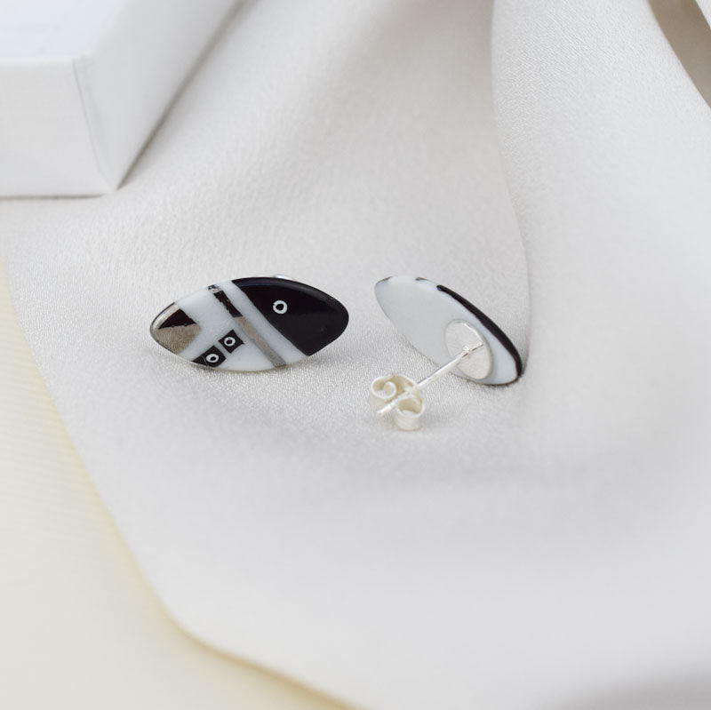 Porcelain stud earrings created and hand-painted by Vali Bondoc with high temperature ceramic dyes and colloidal platinum