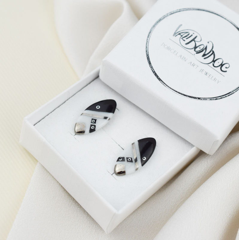 Porcelain stud earrings created and hand-painted by Vali Bondoc with high temperature ceramic dyes and colloidal platinum