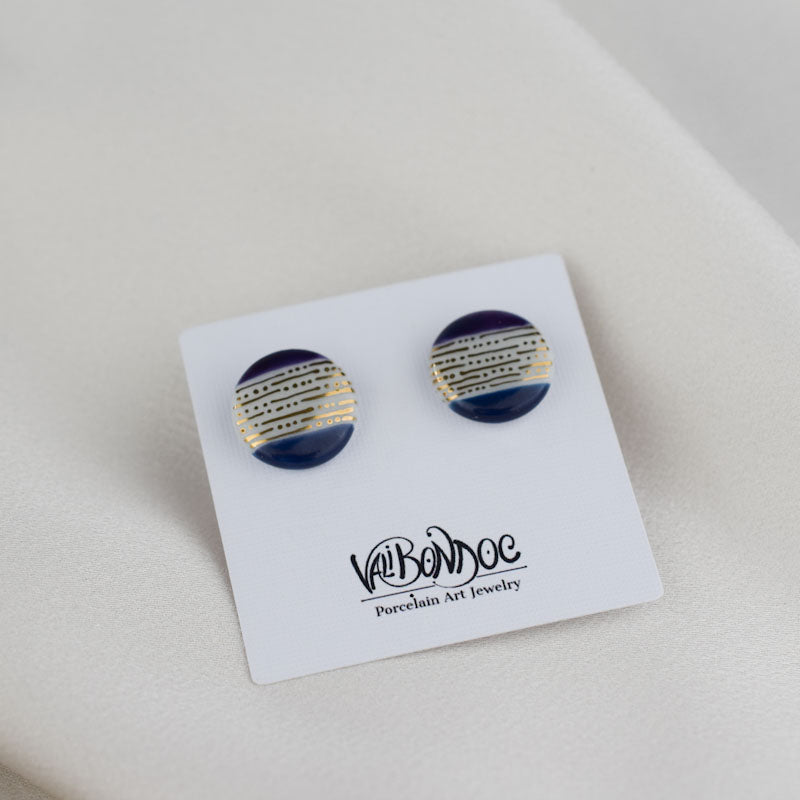 Porcelain stud earrings created and hand-painted by Vali Bondoc with high temperature ceramic dyes and gold