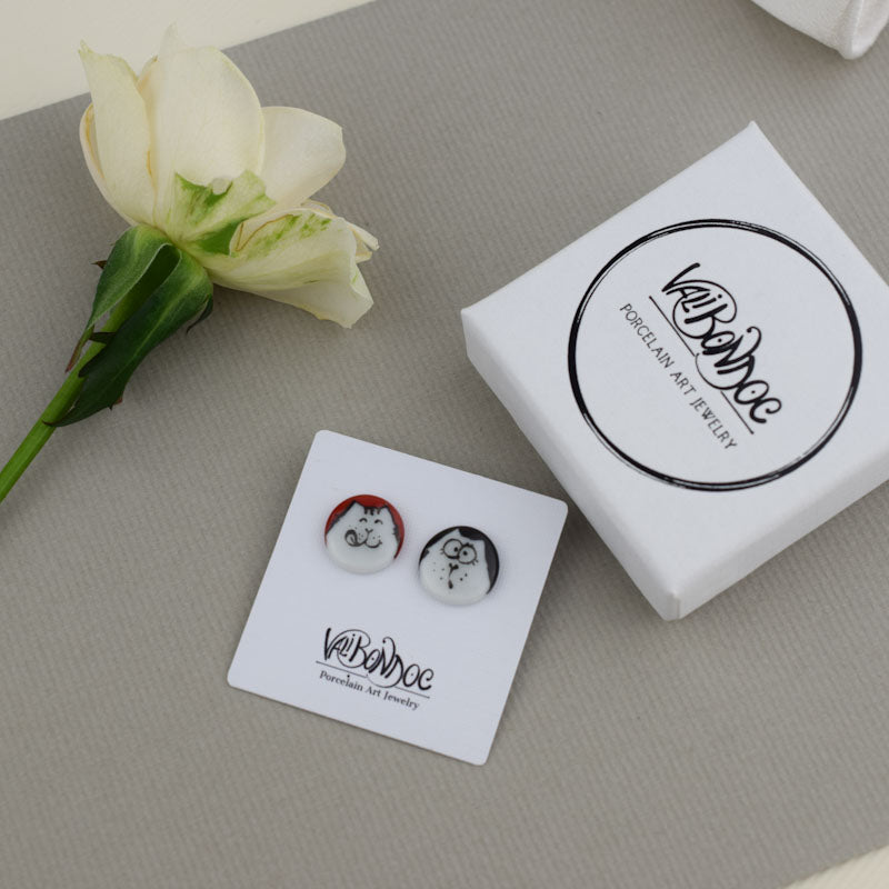 Porcelain stud earrings created and hand-painted by Vali Bondoc with high temperature ceramic dyes and gold