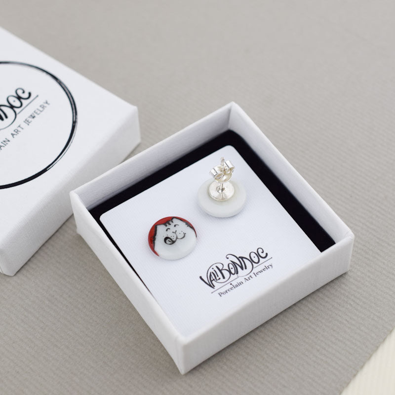 Porcelain stud earrings created and hand-painted by Vali Bondoc with high temperature ceramic dyes and gold