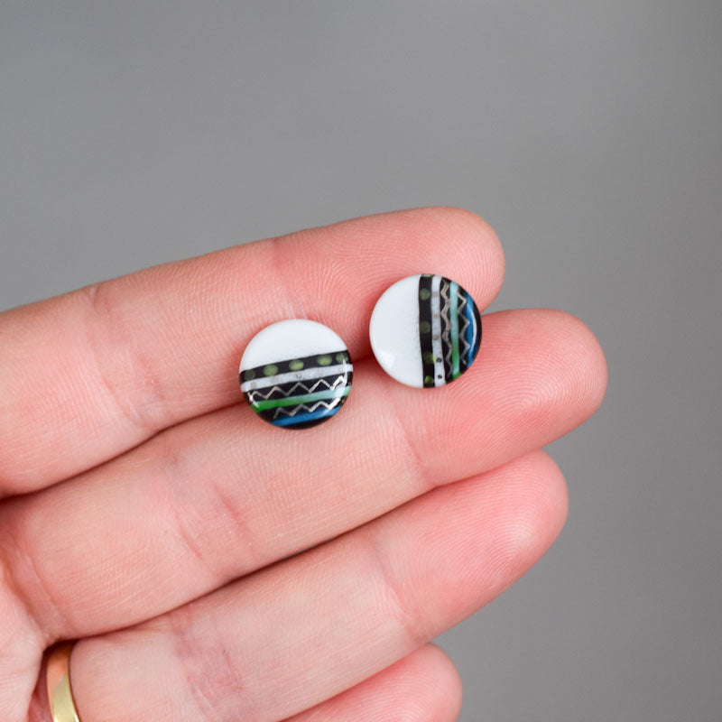 Porcelain stud earrings created and hand-painted by Vali Bondoc with high temperature ceramic dyes and gold