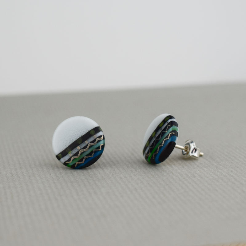 Porcelain stud earrings created and hand-painted by Vali Bondoc with high temperature ceramic dyes
