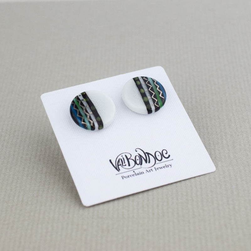 Porcelain stud earrings created and hand-painted by Vali Bondoc with high temperature ceramic dyes and gold
