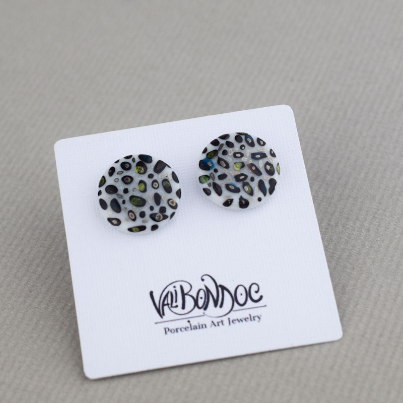 Porcelain stud earrings created and hand-painted by Vali Bondoc with high temperature ceramic dyes
