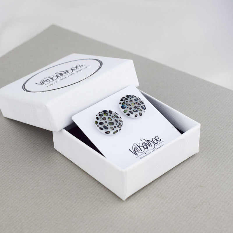 Porcelain stud earrings created and hand-painted by Vali Bondoc with high temperature ceramic dyes and platinum